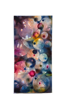 Abstract artwork with colorful bubbles on a light background