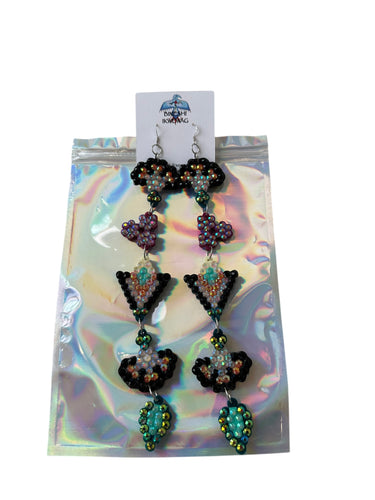 Long triangle earrings  by Bineshi Ikwewag