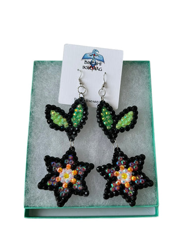 Pink and star flower earrings by Bineshi Ikwewag